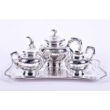 An early 20th century rare Chinese silver tea service comprising a teapot, a lidded sugar bowl, a