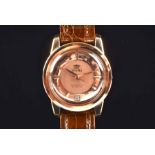 A Fortis 18ct rose gold automatic wristwatch the gilt dial with pink central field, and square and