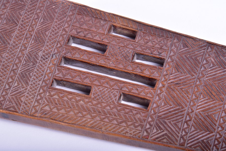 A Polynesian hardwood paddle decorated with pierced head and miniature tightly carved geometric - Image 4 of 8