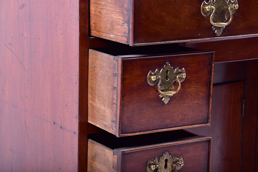 A George II mahogany knee hole desk of small proportions the rectangular top above an arrangement of - Image 6 of 6