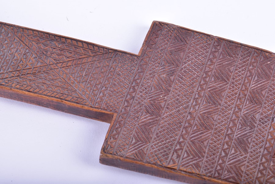 A Polynesian hardwood paddle decorated with pierced head and miniature tightly carved geometric - Image 6 of 8