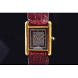 A Must de Cartier Tank silver gilt ladies wristwatch the rectangular grey and black banded dial with