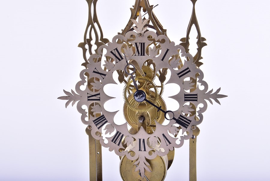 A brass skeleton clock  mounted to an ebonised plinth with glass dome, 48 cm high x 37 cm wide (full - Image 3 of 4