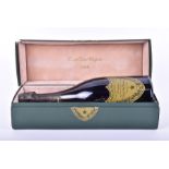 A bottle of 1985 vintage Dom Perignon champagne  in presentation case, 750ml.
