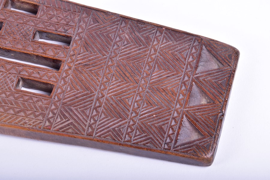 A Polynesian hardwood paddle decorated with pierced head and miniature tightly carved geometric - Image 5 of 8