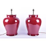 A pair of large Oriental style ceramic table lamps of pot form in burgundy, with shades,