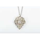 A late Victorian / early Edwardian diamond pendant millegrain set with old- and rose-cut diamonds,