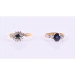 A sapphire and diamond ring centred with an oval mixed-cut sapphire weighing approximately 0.89