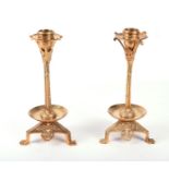 A pair of Victorian Gothic Revival or Aesthetic style brass candlesticks most likely French, the