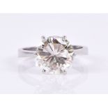 An impressive solitaire diamond ring set with a round brilliant-cut diamond of approximately 3.52