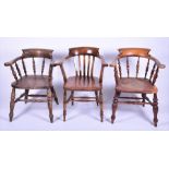 Three 20th century smoker's bow armchairs of varying styles, each circa 62 cm wide. (3)