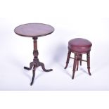 A George III mahogany tripod wine table together with a Victorian mahogany piano stool. (2)