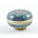A late Qing dynasty cloisonne enamel lidded box designed to the top with a central phoenix and