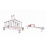 A silver plated Christopher Dresser design toast rack with graduated knopped rods, together with a