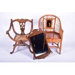 An early 20th century mahogany Glastonbury chair together with a 20th century Chinese faux bamboo