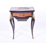 A late 19th century French gilt metal mounted boulle work sewing table with hinged cover and under-