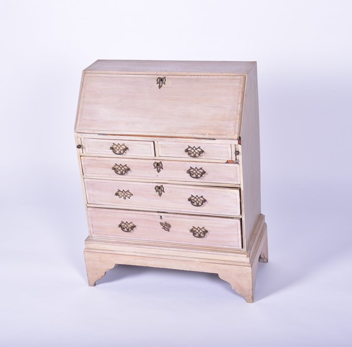 A 20th century child's stripped-wood small bureau the drop opening to reveal a compartmentalised - Image 3 of 6