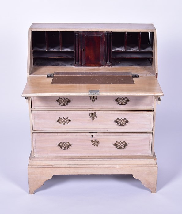 A 20th century child's stripped-wood small bureau the drop opening to reveal a compartmentalised - Image 4 of 6