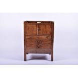 A George III mahogany night stand with two cupboard doors over three drawers, on plain legs, 79 cm x