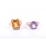 An unusual 14ct yellow gold and citrine ring of naturalistic design, the emerald-cut citrine in a