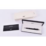 A Mont Blanc Starwalker ballpoint pen with black resin body, in original box.