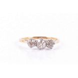 A Victorian 18ct yellow gold and diamond ring set with three old-cut diamonds of approximately 0.