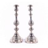 A pair of George V silver Sabbath candlesticks London, 1925, by Sigmund Zyto, designed with