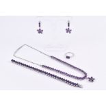 A contemporary silver and amethyst parure set with mixed oval-cut amethysts, the set including a