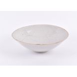 A Chinese Song Dynasty celadon bowl the interior with incised scroll decoration, 6.5 cm high x 19 cm