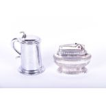 A Dunhill chrome table lighter in the form of a tankard 8.4 cm high, together with a Ronson table