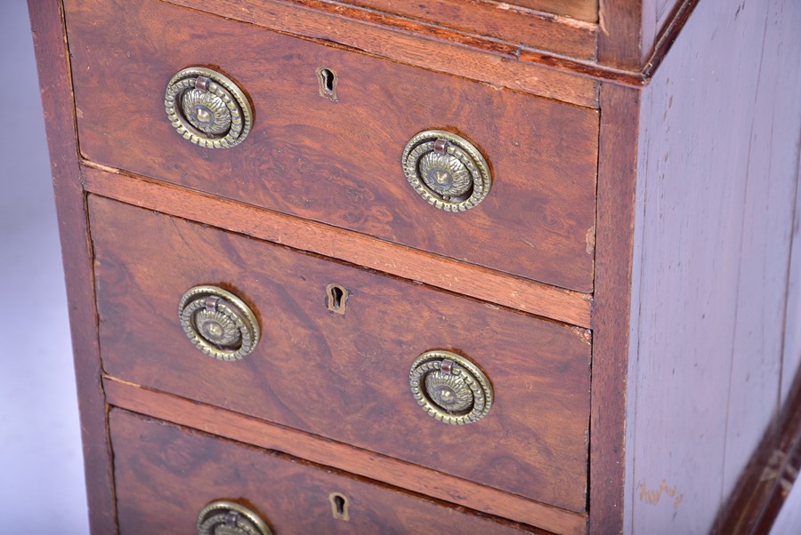 A Victorian figured walnut small pedestal desk the inset red leather top over three frieze drawers - Image 2 of 4