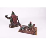 Two Austrian style contemporary cold painted bronzes one modelled as a rug seller mounted on a