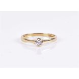 Mappin & Webb. An 18ct yellow gold and diamond ring collet-set with a solitaire round brilliant-