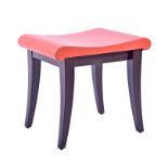 A Philippe Hurel dressing table stool  made in solid hardwood with orange leather upholstery, the
