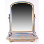 A turn of the century chinoiserie dressing table mirror painted in pale blue and gilt with pagoda