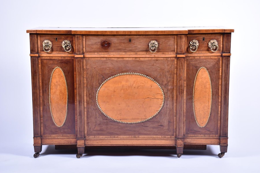 A small Edwardian mahogany and satinwood ‘dining table leaf’ cabinet in George III style, with