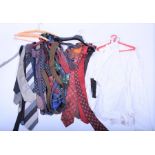 A quantity of vintage and antique gentleman's clothing to include various silk, cotton and tweed