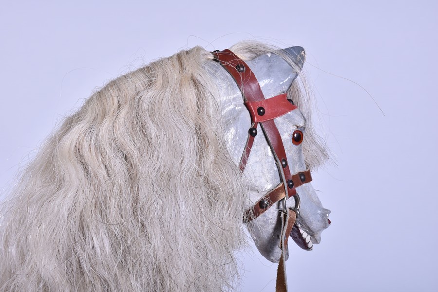 An early 20th century painted rocking horse with padded leather saddle and bridle, on rocker base - Image 5 of 6