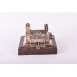 A Dutch silver model of a synagogue  the body decorated with etched brick work and window panels,