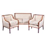 An Edwardian mahogany and kingwood two-seater sofa together with two matching square shaped