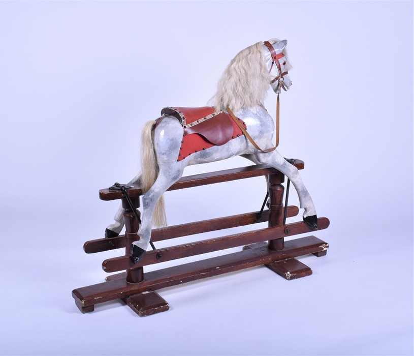 An early 20th century painted rocking horse with padded leather saddle and bridle, on rocker base - Image 4 of 6