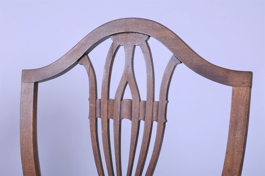 A pair of late Georgian mahogany shield back dining chairs after a design by George Hepplewhite with - Image 4 of 5