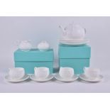 A Tiffany & Co. 'Sea Urchin' tea set comprising: a teapot, milk jug, a covered sugar bowl, four side