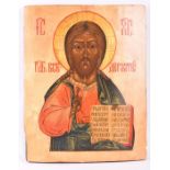 A large late 19th century Russian icon of Christ in the Pantocrator style, Christ holds the book