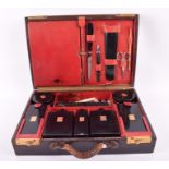 A 1920s-30s French Art Deco S.T. Dupont lady's or gentleman's travelling vanity case with brown