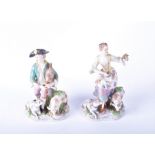 A pair of Royal Vienna porcelain figures modelled as a shepherdess and shepherd with bagpipes,
