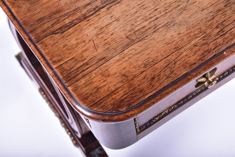 A Regency rosewood and brass mounted lyre end library table in the manner of Gillows, with four - Image 7 of 8