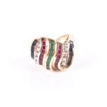 A 14ct yellow gold, diamond, ruby, sapphire, and emerald ring of swirled form, the raised mount