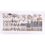 A large quantity of Continental silver, white metal and silver plated flatware to include a set of