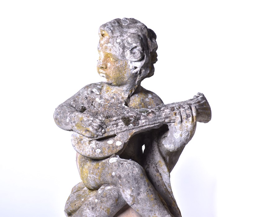 A set of four 20th century Italian musical cherub stoneware sculptures each seated on a sphere, - Image 3 of 17